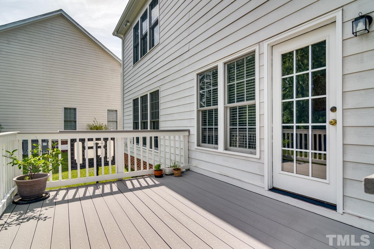 8208 Manatee Court Raleigh, NC 27616 - Photo 26 of 30 a view of a wooden deck