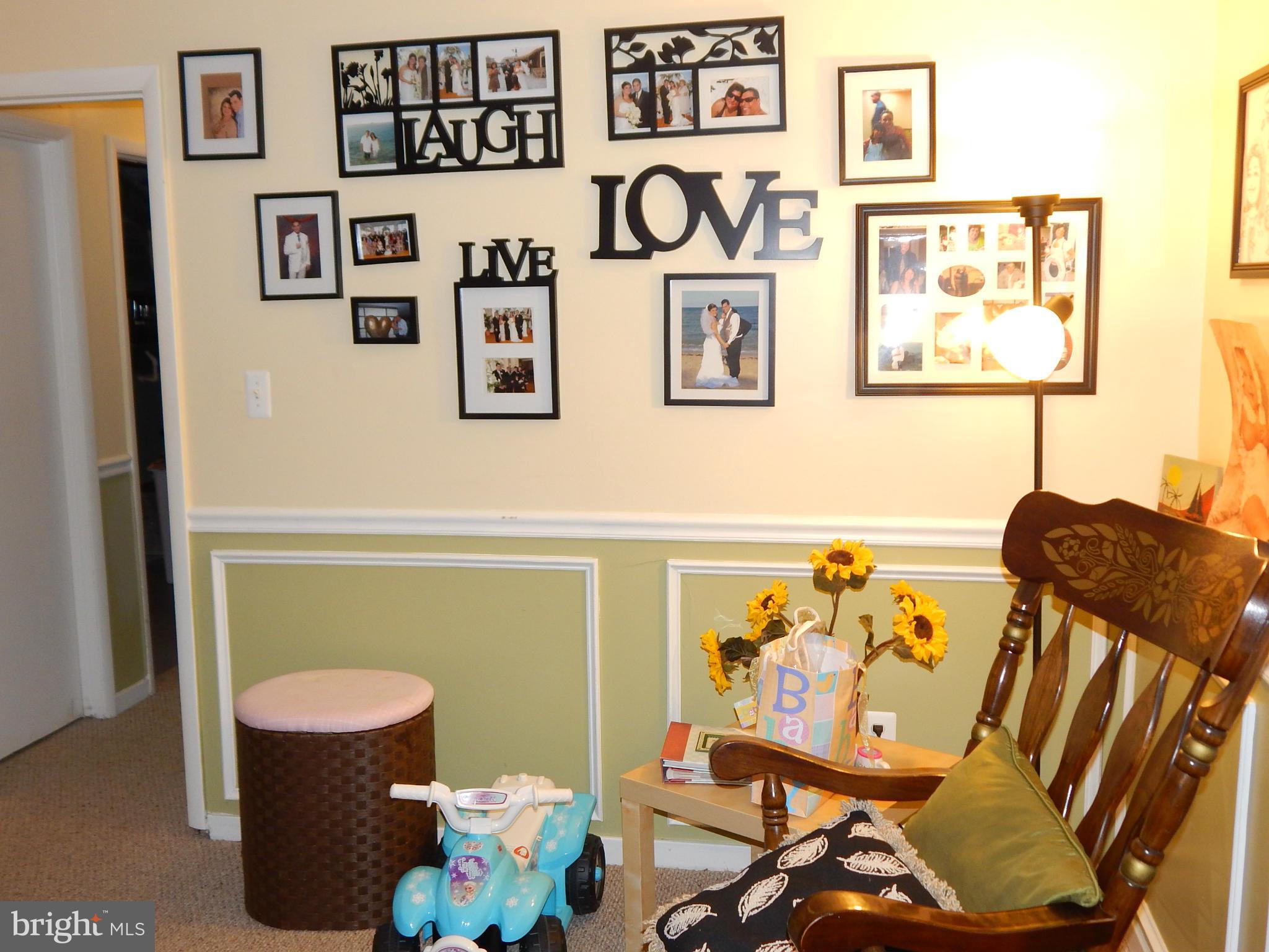 9537 Kilimanjaro Road Columbia, MD 21045 - Photo 22 of 26 a view of a workspace with furniture and toys