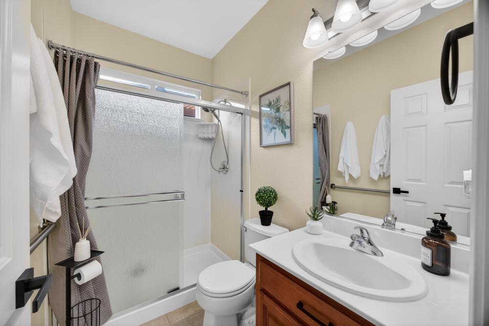 3670 Topaz Road West Sacramento, CA 95691 - Photo 13 of 97 a bathroom with a sink toilet and shower