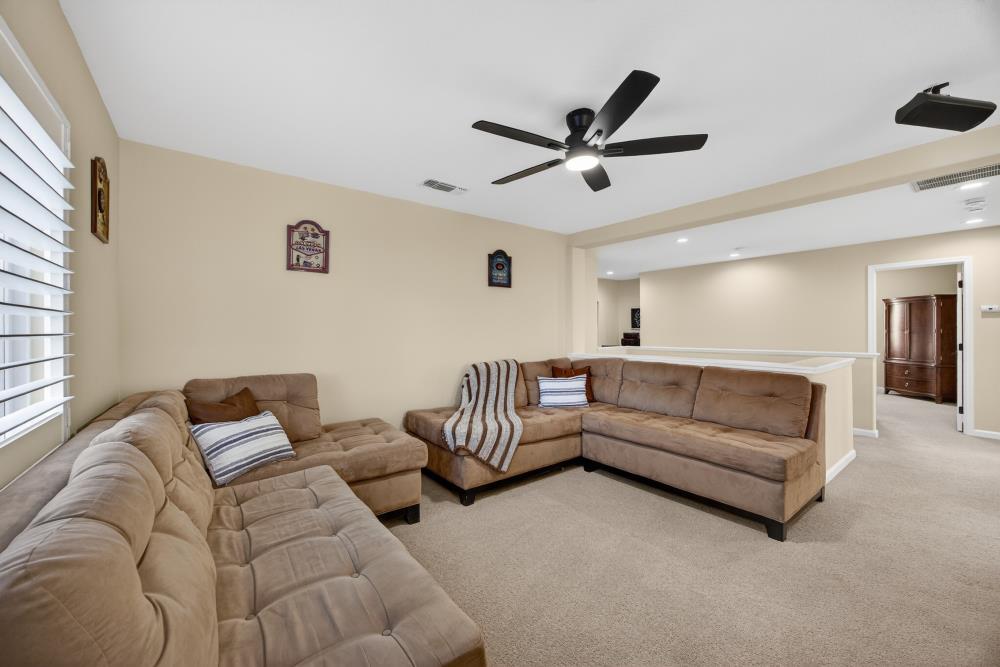3670 Topaz Road West Sacramento, CA 95691 - Photo 18 of 97 a living room with furniture and a ceiling fan