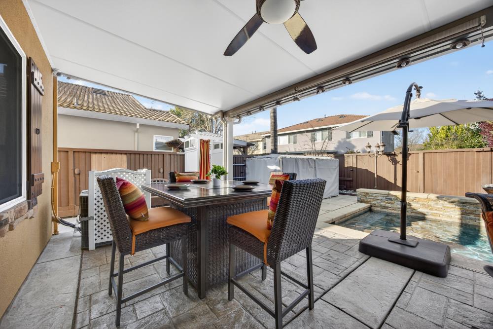 3670 Topaz Road West Sacramento, CA 95691 - Photo 35 of 97 a dining room with furniture and a floor to ceiling window