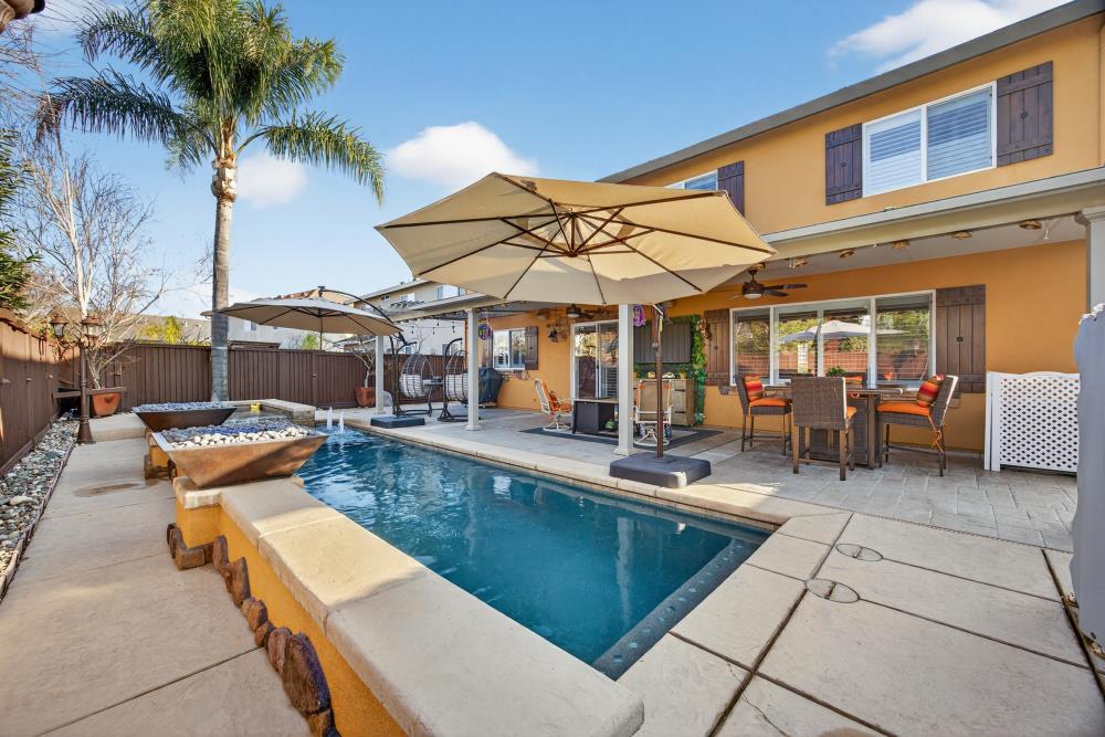 3670 Topaz Road West Sacramento, CA 95691 - Photo 37 of 97 a view of a patio with swimming pool table and chairs