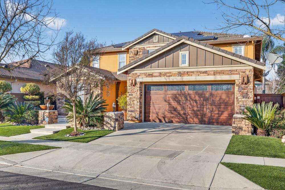 3670 Topaz Road West Sacramento, CA 95691 - Photo 57 of 97 a front view of a house with a yard and potted plants