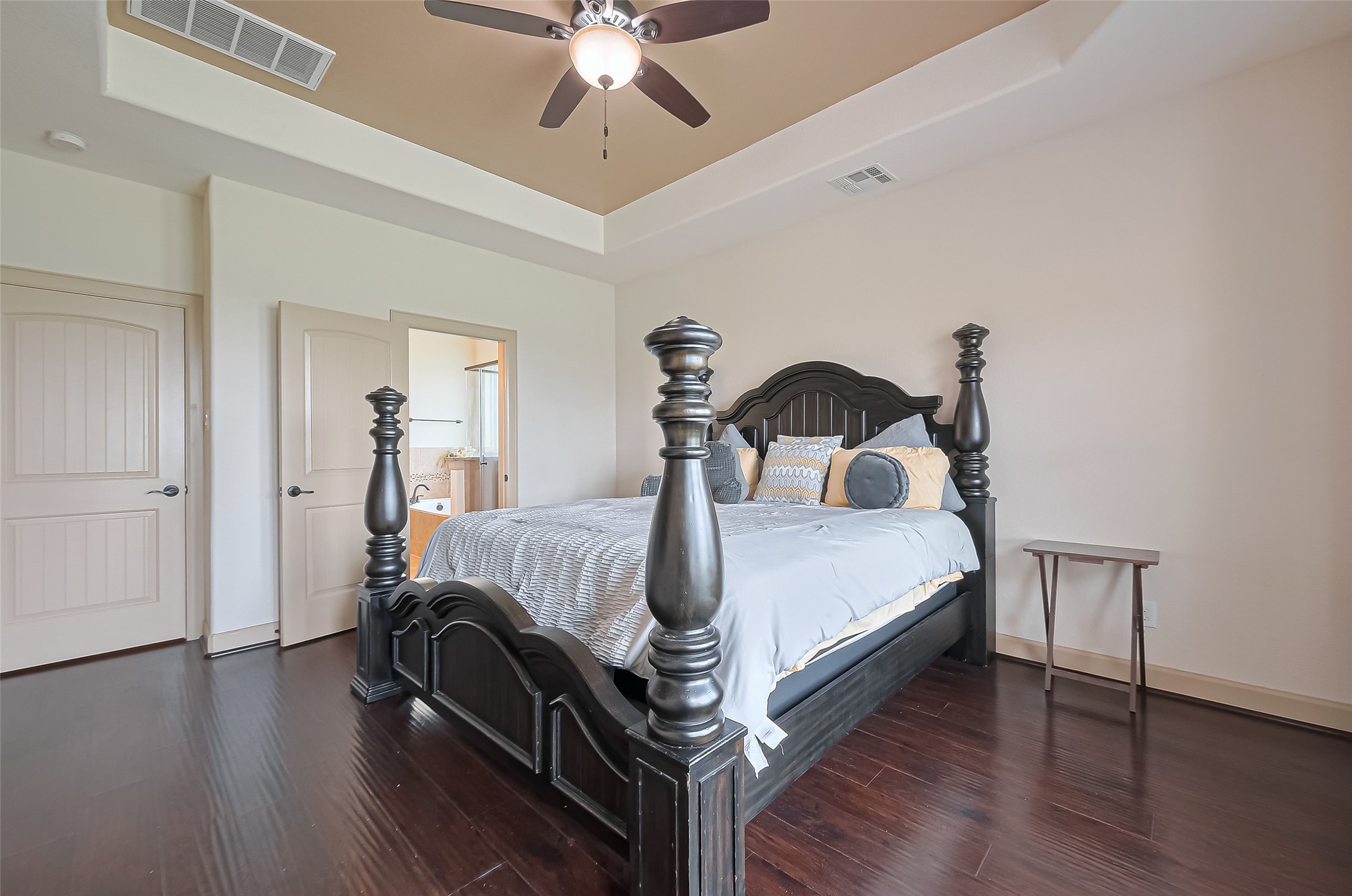 4810 Dubuque Parkway Rosharon, TX 77583 - Photo 18 of 45 a bedroom with bed and a chandelier