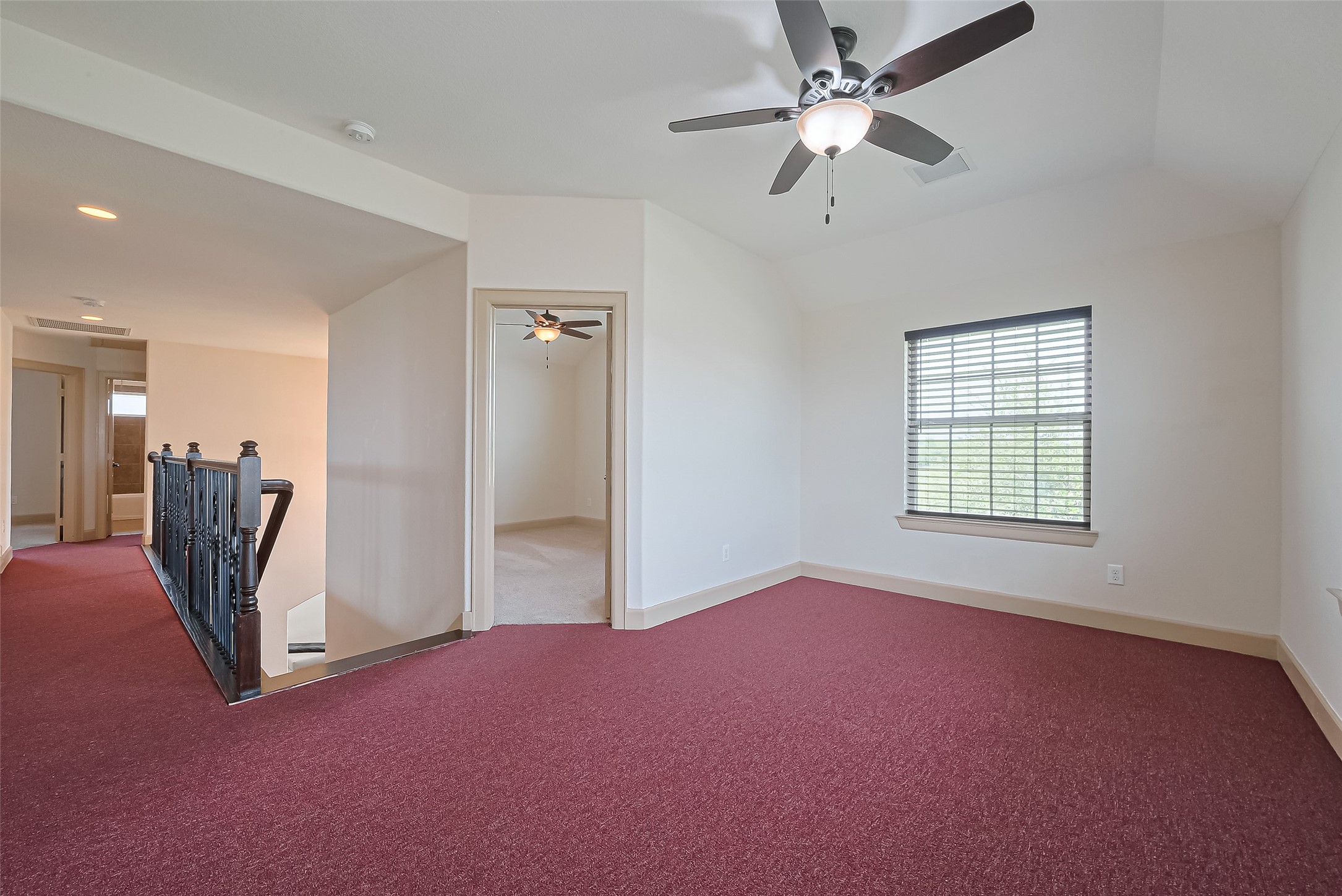 4810 Dubuque Parkway Rosharon, TX 77583 - Photo 22 of 45 a view of a livingroom with a ceiling fan and window