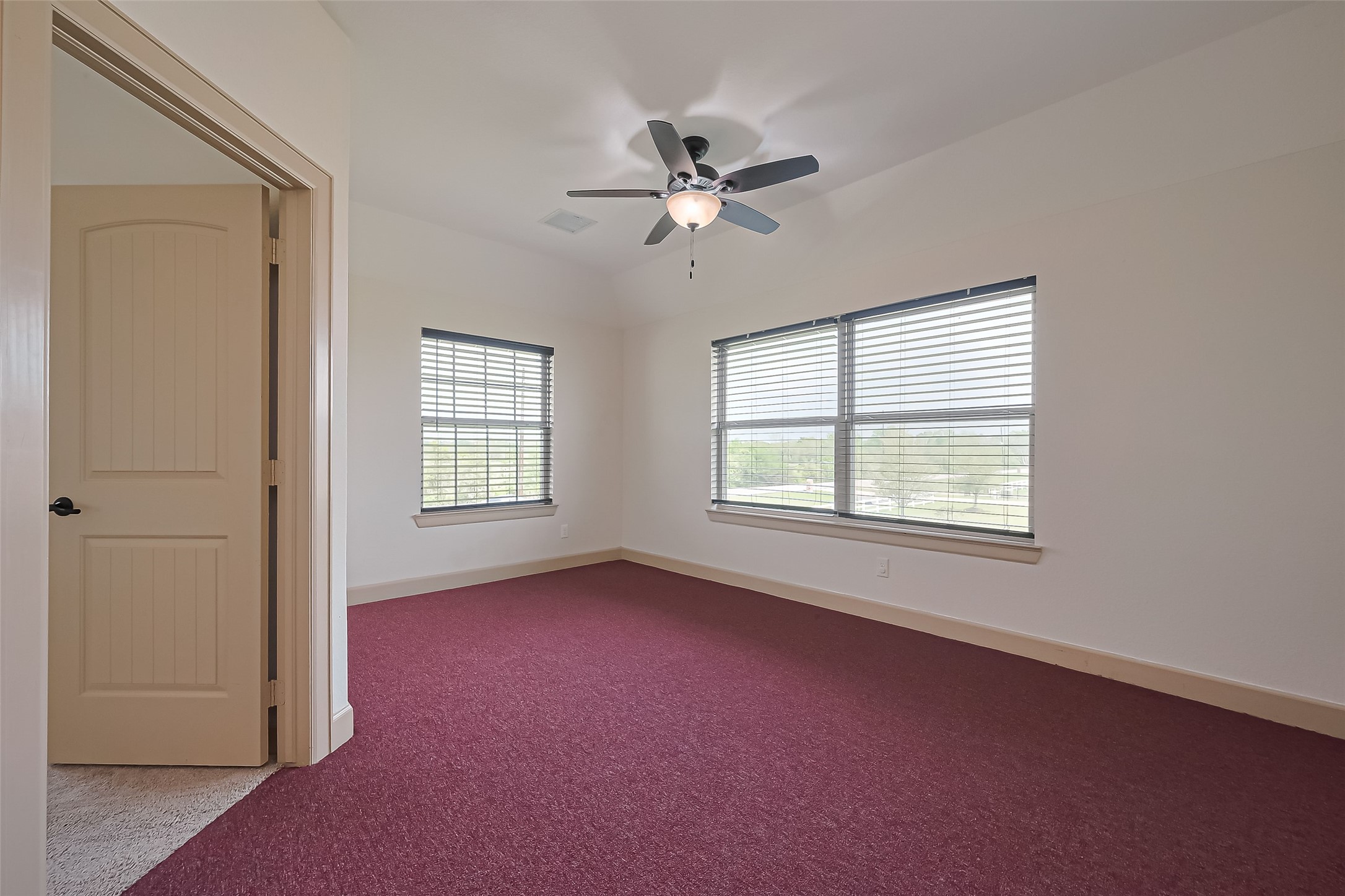 4810 Dubuque Parkway Rosharon, TX 77583 - Photo 23 of 45 a view of a livingroom with a ceiling fan and window