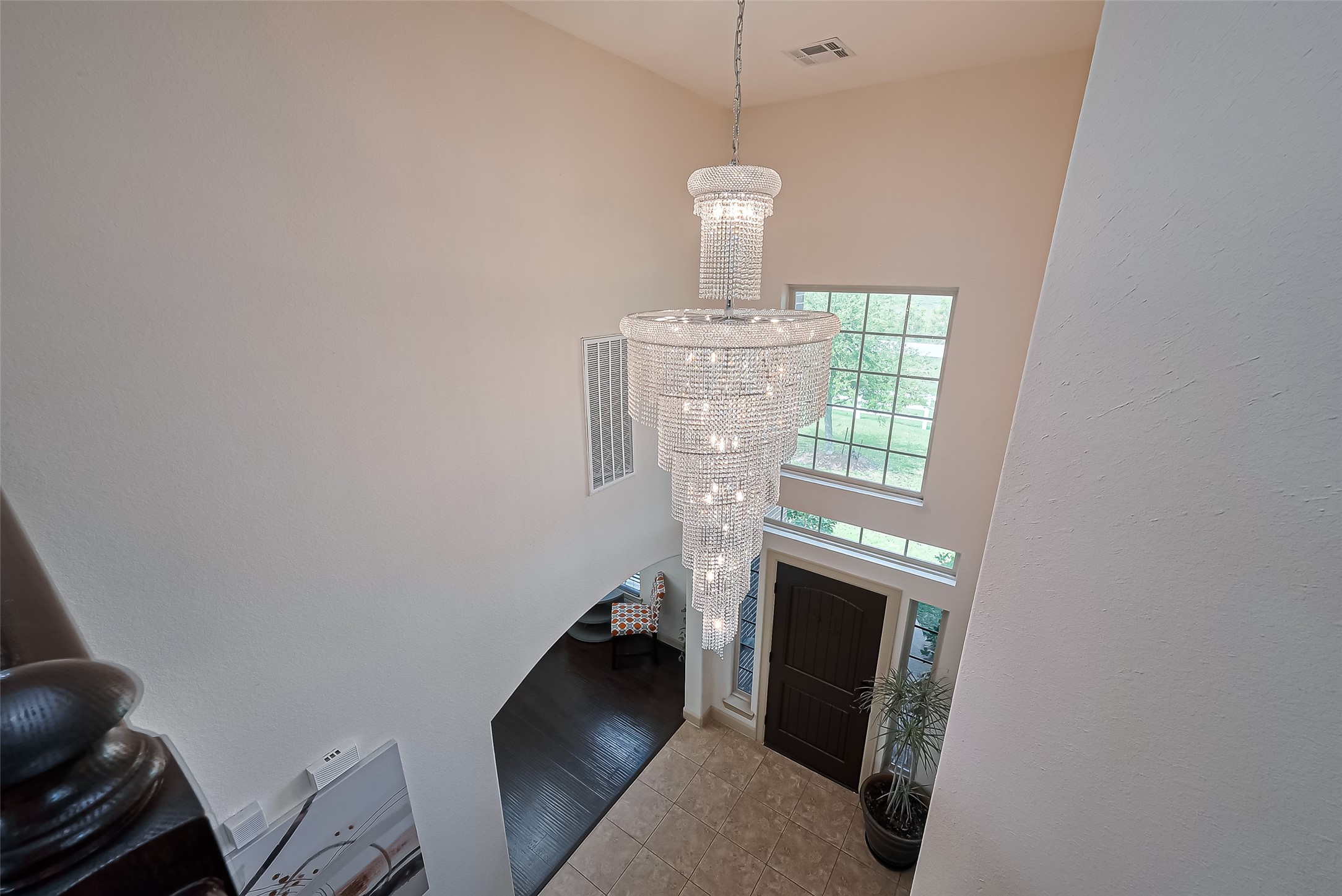 4810 Dubuque Parkway Rosharon, TX 77583 - Photo 24 of 45 a living room with furniture a fireplace and a chandelier