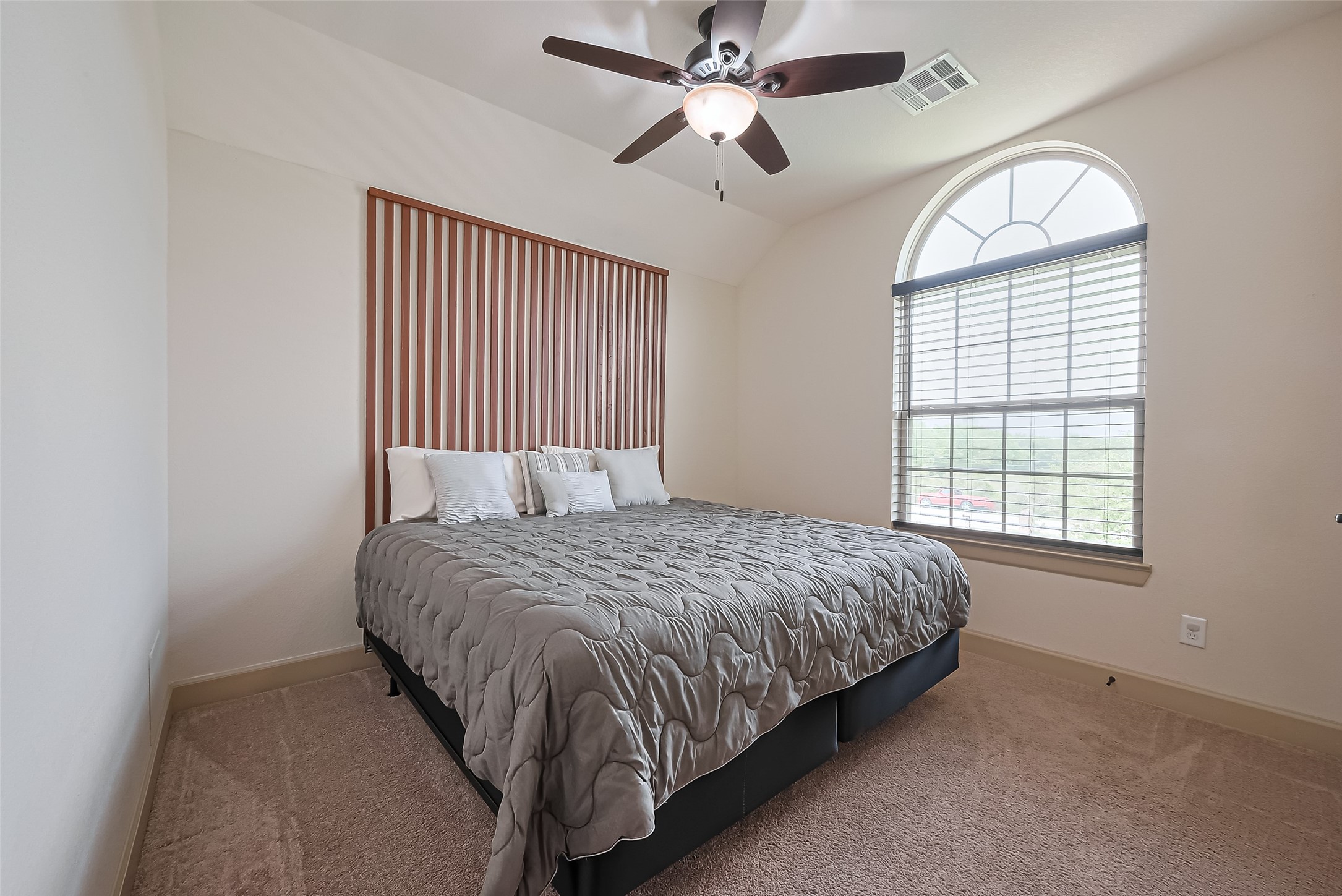 4810 Dubuque Parkway Rosharon, TX 77583 - Photo 25 of 45 a bedroom with a bed and a window