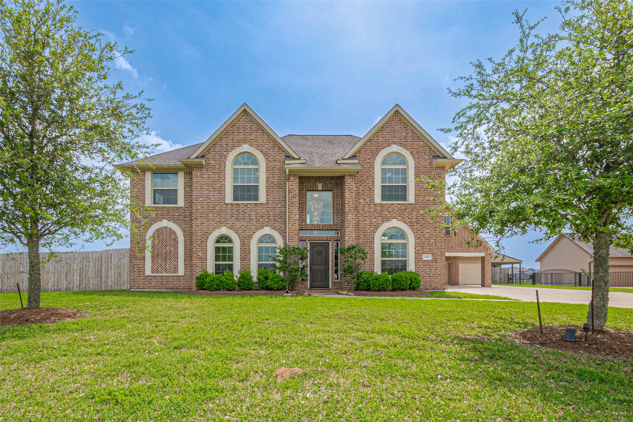 4810 Dubuque Parkway Rosharon, TX 77583 - Photo 43 of 45 a front view of a house with a yard and garage
