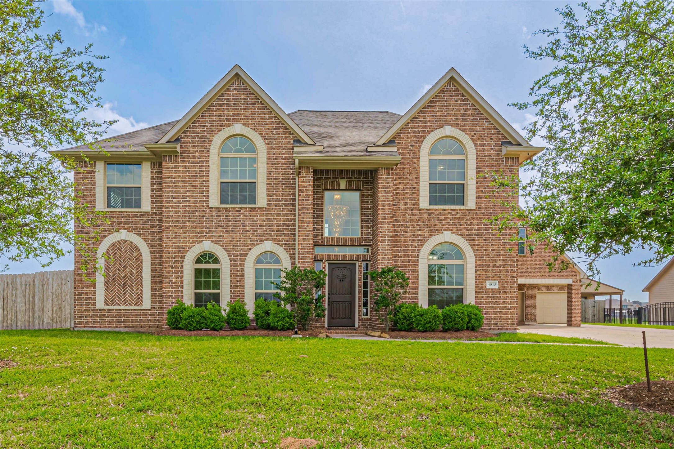 4810 Dubuque Parkway Rosharon, TX 77583 - Photo 6 of 45 a front view of a house with a yard and garage