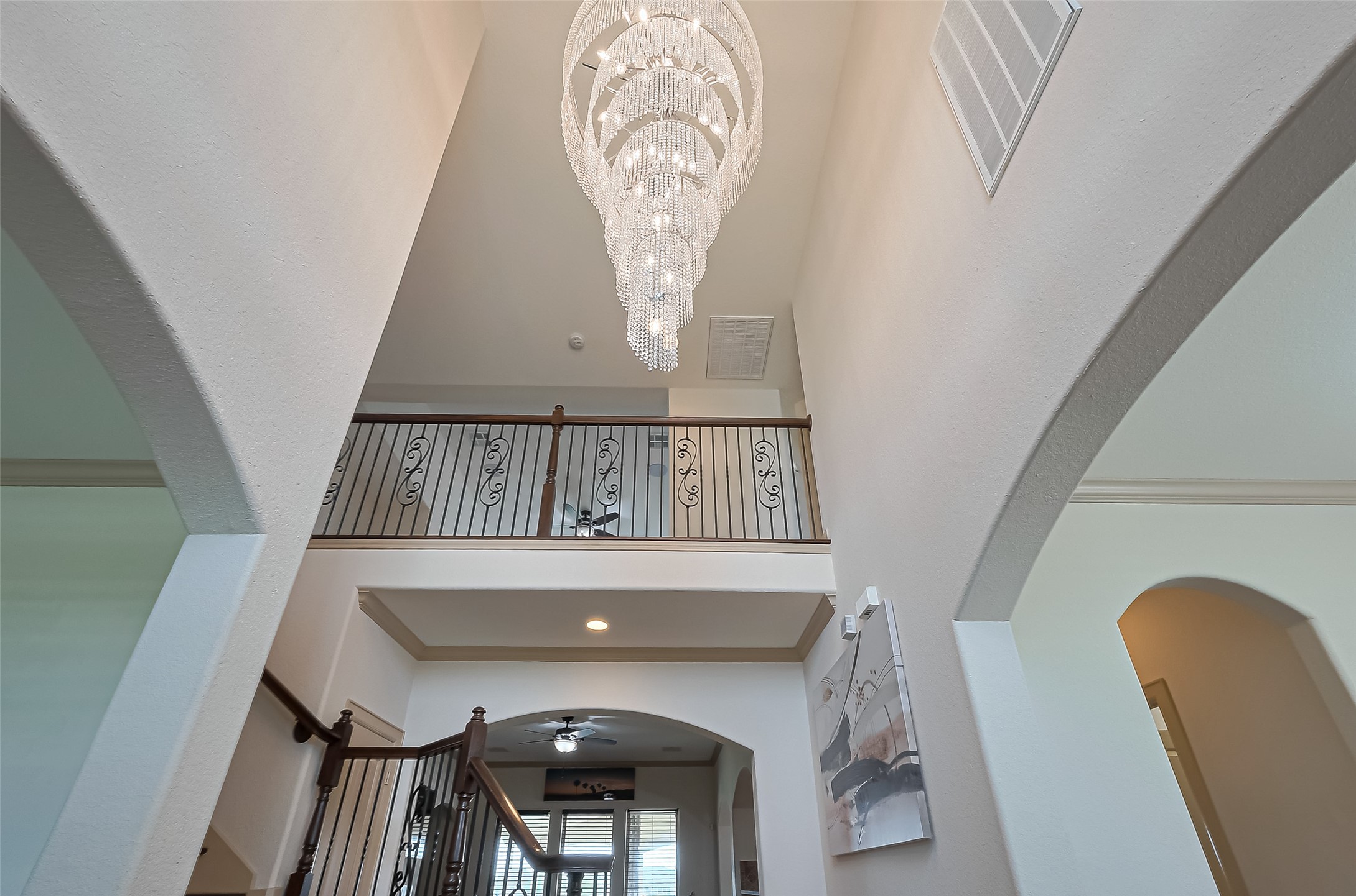 4810 Dubuque Parkway Rosharon, TX 77583 - Photo 7 of 45 a view of staircase with a table and a chandelier