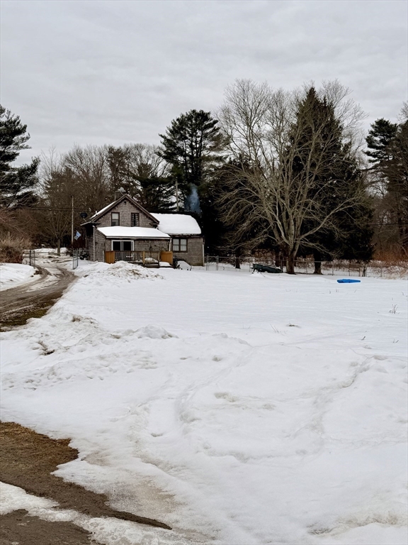 48 Broad Street Rehoboth, MA 02769 - Photo 12 of 19 a view of a yard with snow on the road