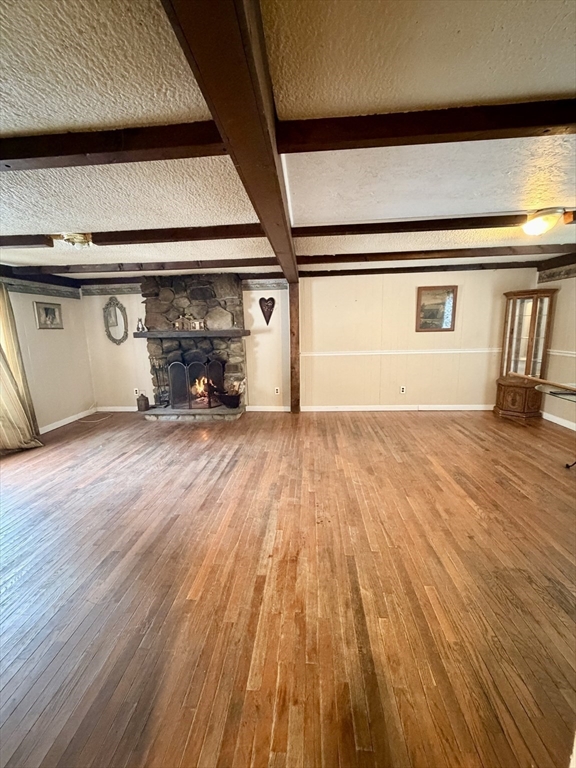 48 Broad Street Rehoboth, MA 02769 - Photo 4 of 19 a view of an empty room and wooden floor