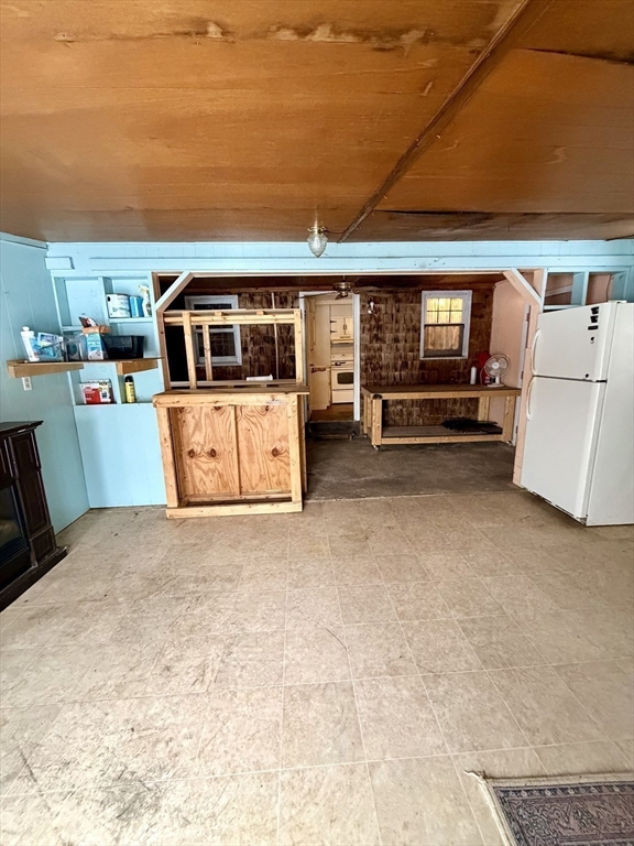 48 Broad Street Rehoboth, MA 02769 - Photo 10 of 19 a view of a house with a barbeque and large trees