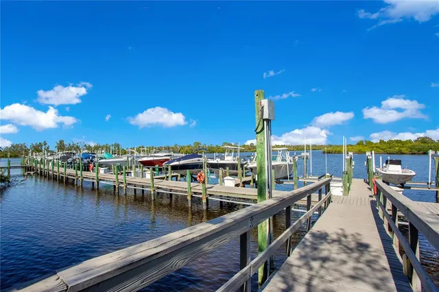 a view of a balcony with chairs