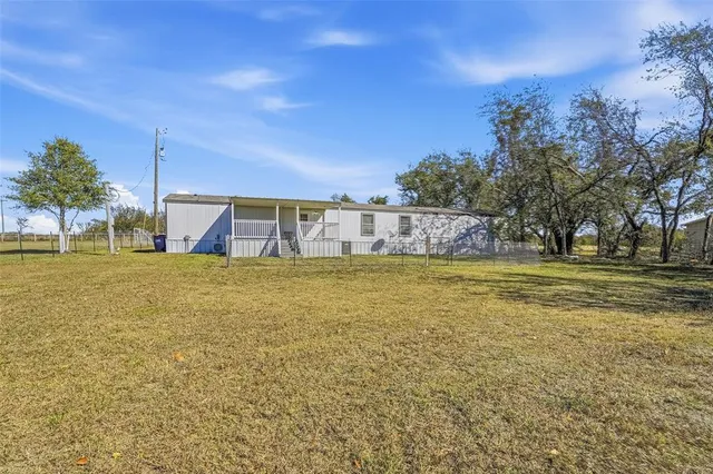 a view of swimming pool with outdoor seating