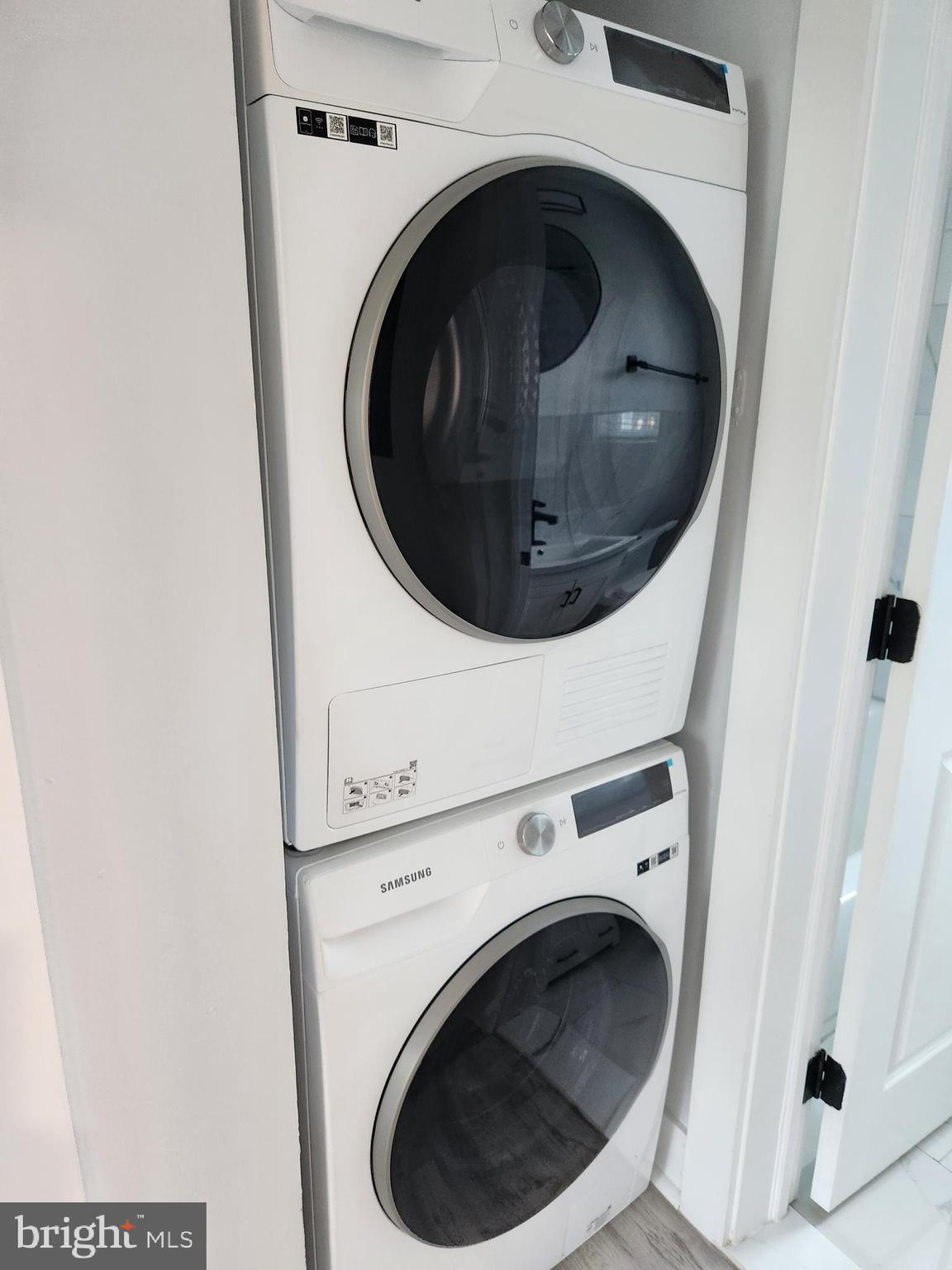 3809 V Street Southeast, Unit 202 Washington, DC 20020 - Photo 15 of 20 a utility room with dryer and washer