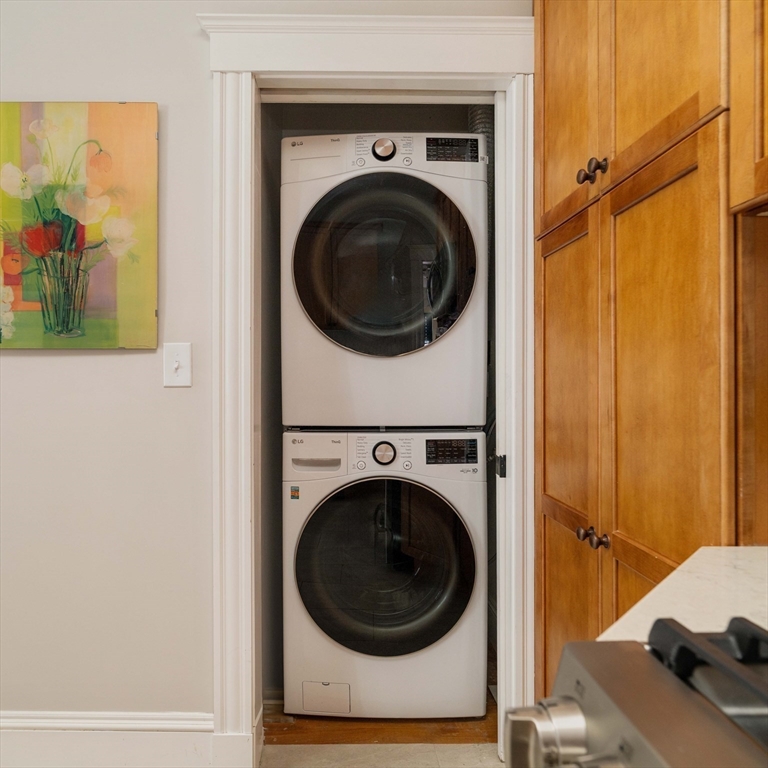 59 Pemberton Street, Unit 1 Cambridge, MA 02140 - Photo 15 of 30 a utility room with dryer and washer