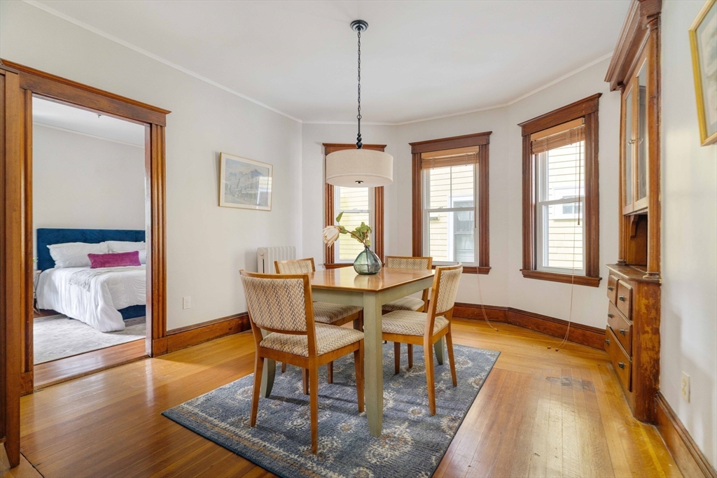 59 Pemberton Street, Unit 1 Cambridge, MA 02140 - Photo 17 of 30 a view of a dining room with furniture window and wooden floor