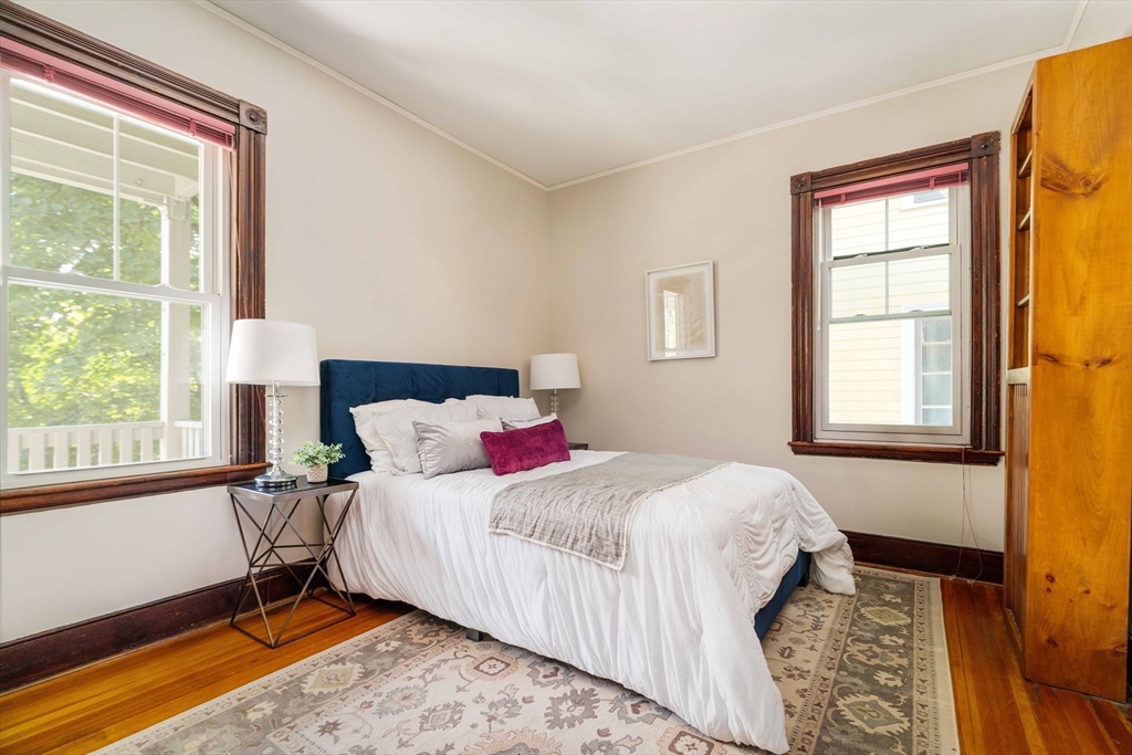 59 Pemberton Street, Unit 1 Cambridge, MA 02140 - Photo 24 of 30 a bedroom with a bed and a window