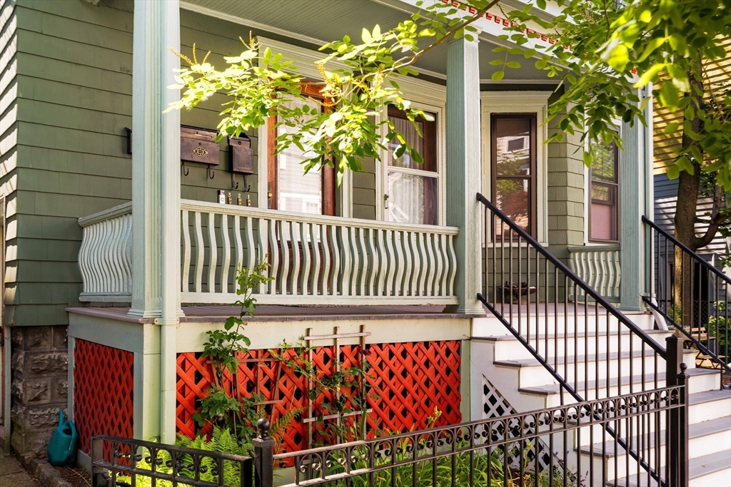 59 Pemberton Street, Unit 1 Cambridge, MA 02140 - Photo 3 of 30 a view of a porch with a bench
