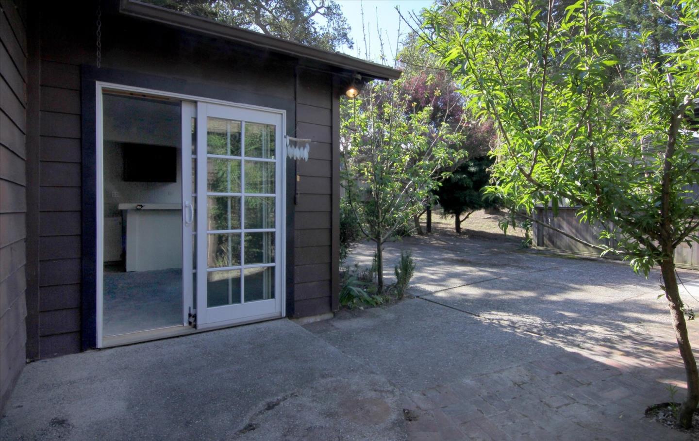 1251 Pacific Street Monterey, CA 93940 - Photo 19 of 25 a view of a house with a yard