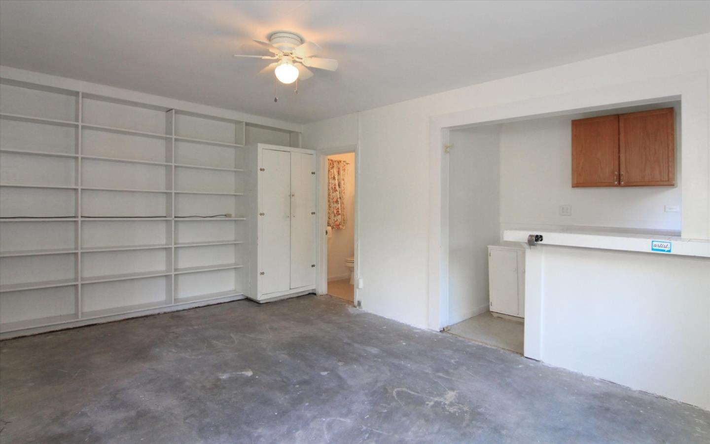 1251 Pacific Street Monterey, CA 93940 - Photo 20 of 25 a view of a livingroom with a ceiling fan and entryway