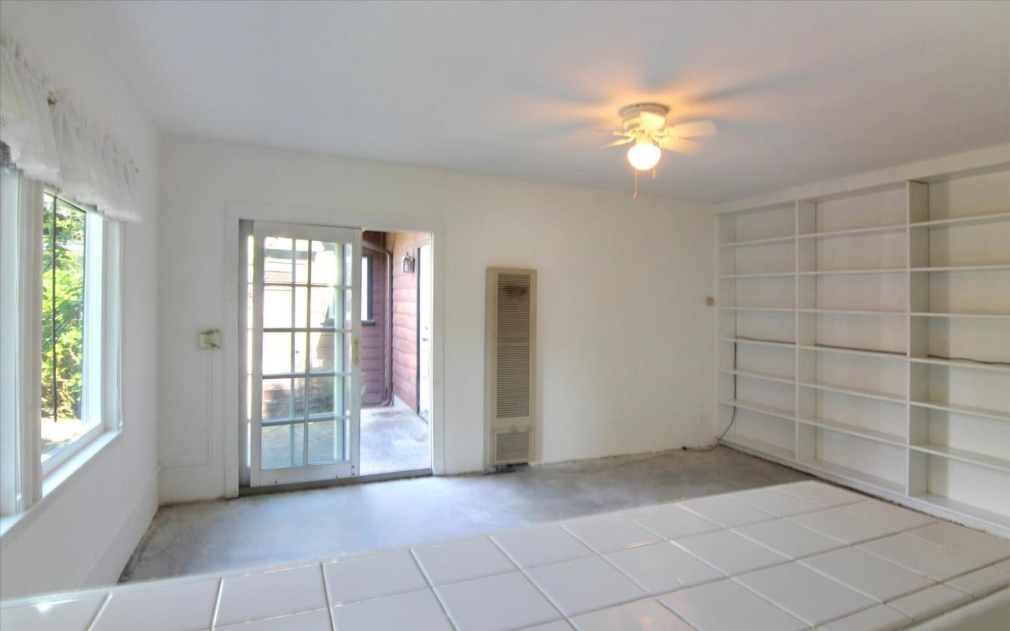 1251 Pacific Street Monterey, CA 93940 - Photo 22 of 25 a view of an empty room with a window