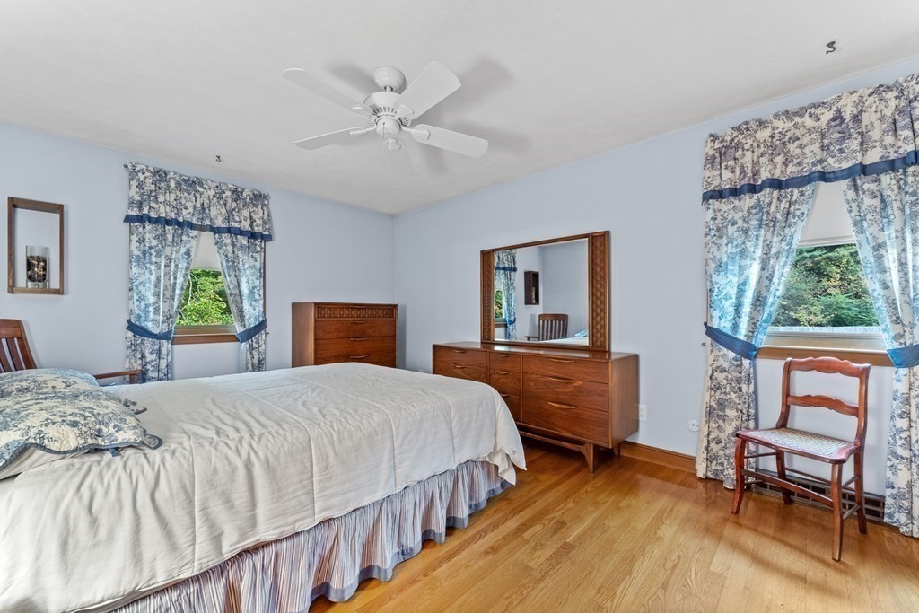 135 Rustic Road Walpole, MA 02032 - Photo 22 of 37 a bedroom with a bed and a window