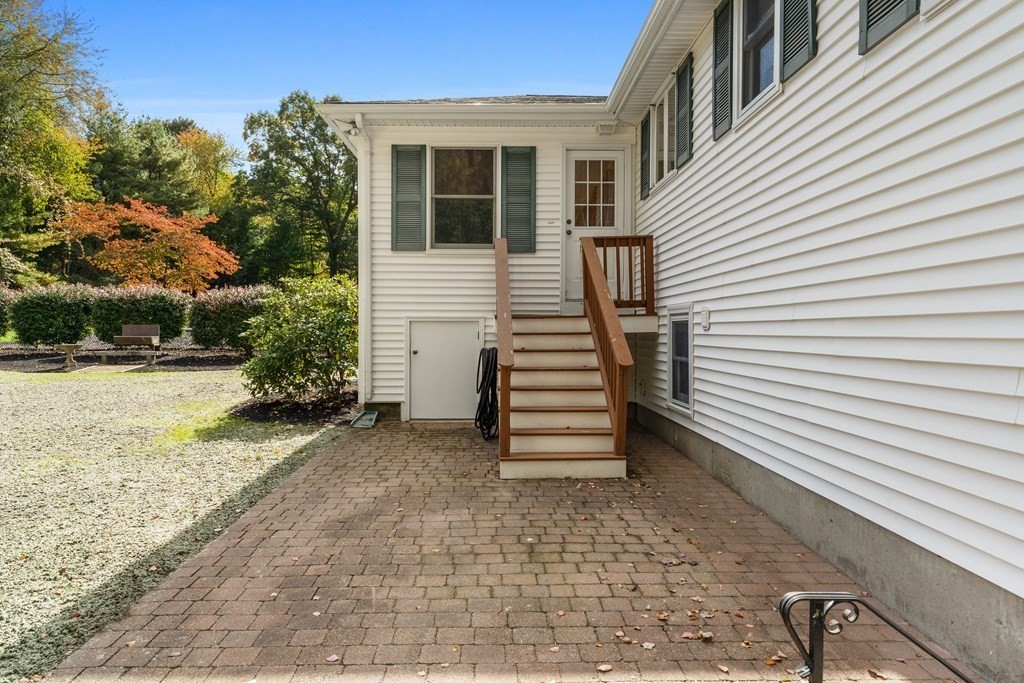 135 Rustic Road Walpole, MA 02032 - Photo 33 of 37 a view of a house with a yard