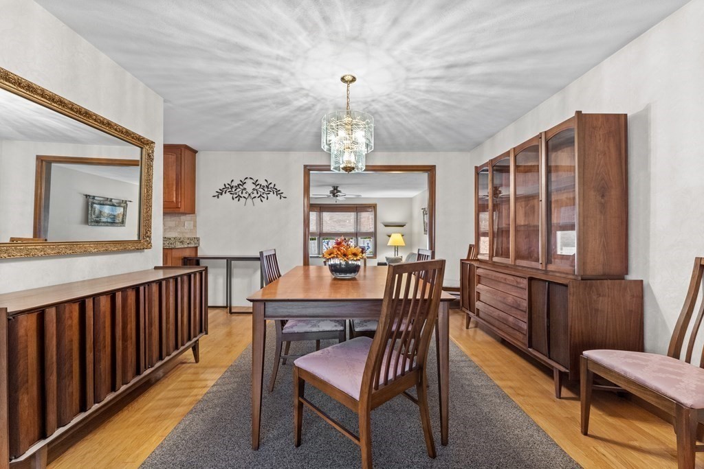 135 Rustic Road Walpole, MA 02032 - Photo 4 of 37 a view of a dining room with furniture window and wooden floor