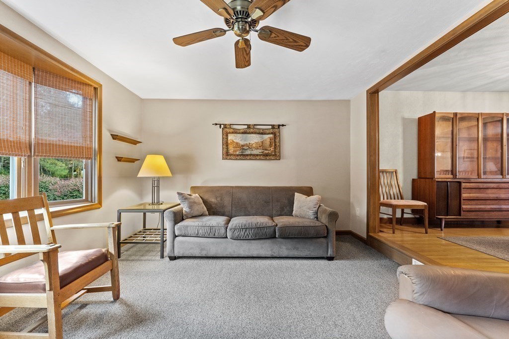 135 Rustic Road Walpole, MA 02032 - Photo 10 of 37 a living room with furniture and a large window