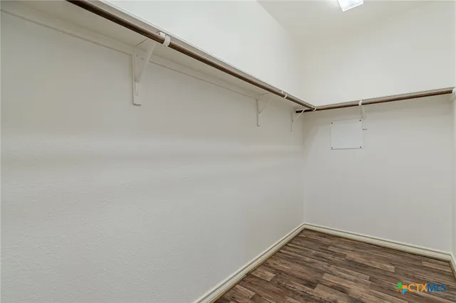 a view of a room with racks on the wall