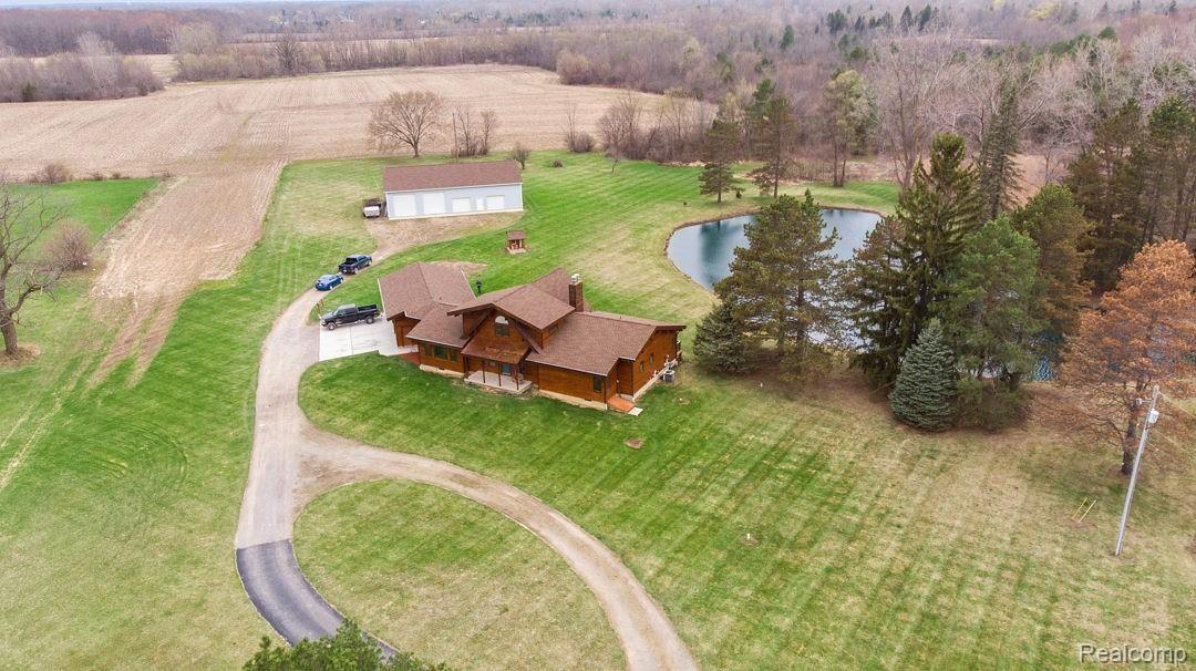 4353 North Irish Road Davison, MI 48423 - Photo 7 of 43 10 Ac. with pond, pole barn, woods and West (back) Property line is approx 300' into the field.