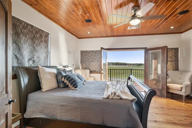 a bathroom with a sink a mirror and a window