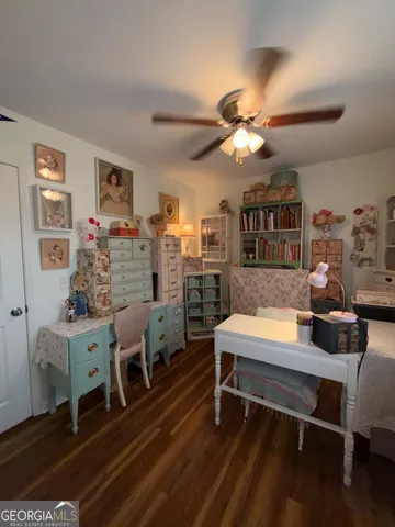 a room with furniture and wooden floor