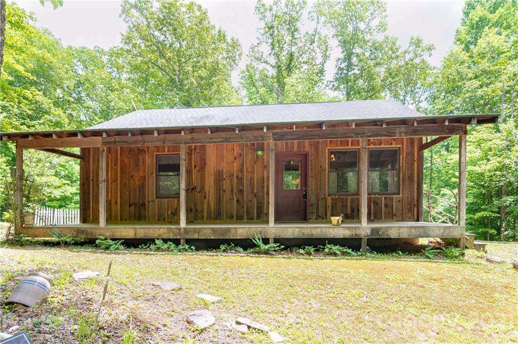 84 Blossom Road Brevard, NC 28712 - Photo 13 of 19 front view of a house with a yard