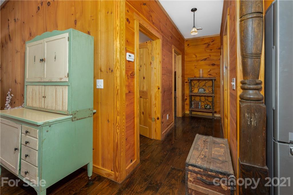 84 Blossom Road Brevard, NC 28712 - Photo 6 of 19 a kitchen with a refrigerator and countertop