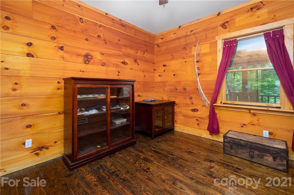 84 Blossom Road Brevard, NC 28712 - Photo 10 of 19 a view of a room with wooden floor