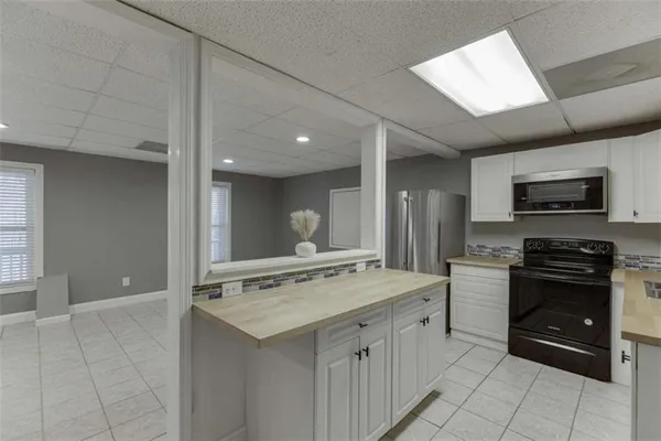 a view of a yard covered with snow