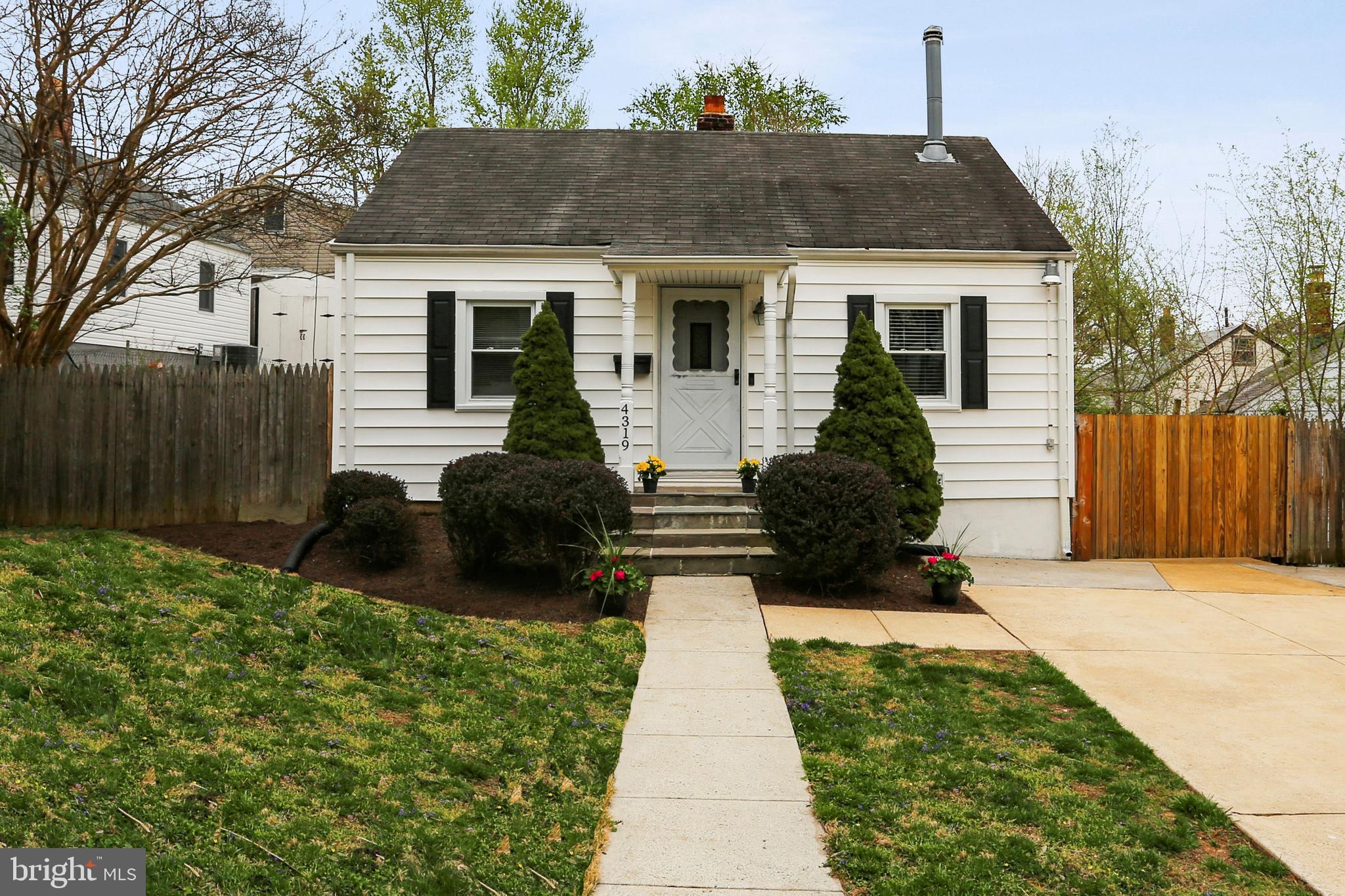 4319 Fernhill Road Silver Spring, MD 20906 - Photo 1 of 29 a front view of a house with garden