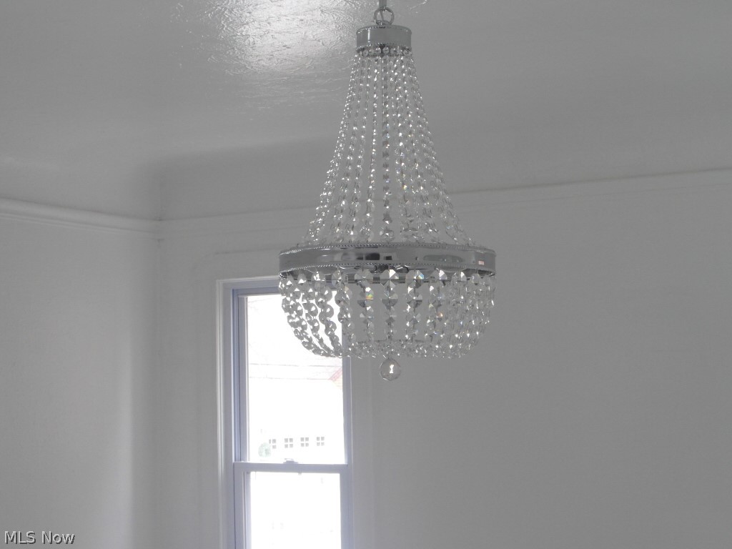 1222 Castleton Road Cleveland, OH 44121 - Photo 10 of 32 chandelier dining room