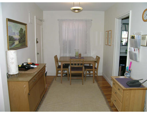 75 Strathmore Road, Unit 4 Boston, MA 02135 - Photo 3 of 13 a dining room with furniture and window