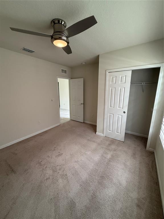 619 Citrus Isle Boulevard Davenport, FL 33837 - Photo 6 of 21 a view of an empty room
