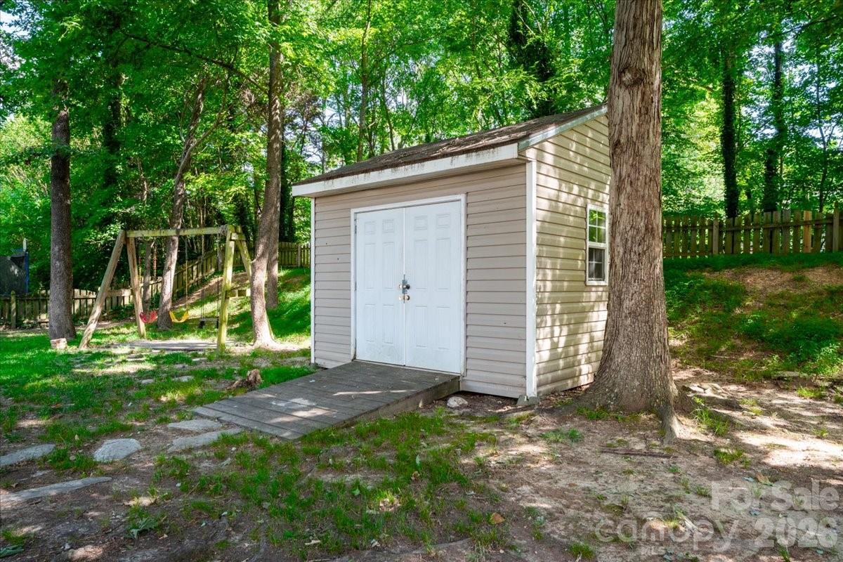 8006 Fine Robe Drive Indian Trail, NC 28079 - Photo 36 of 36 a view of a house with backyard and garden