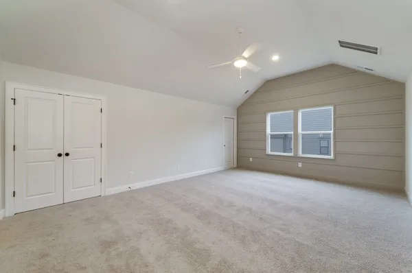 an empty room with windows