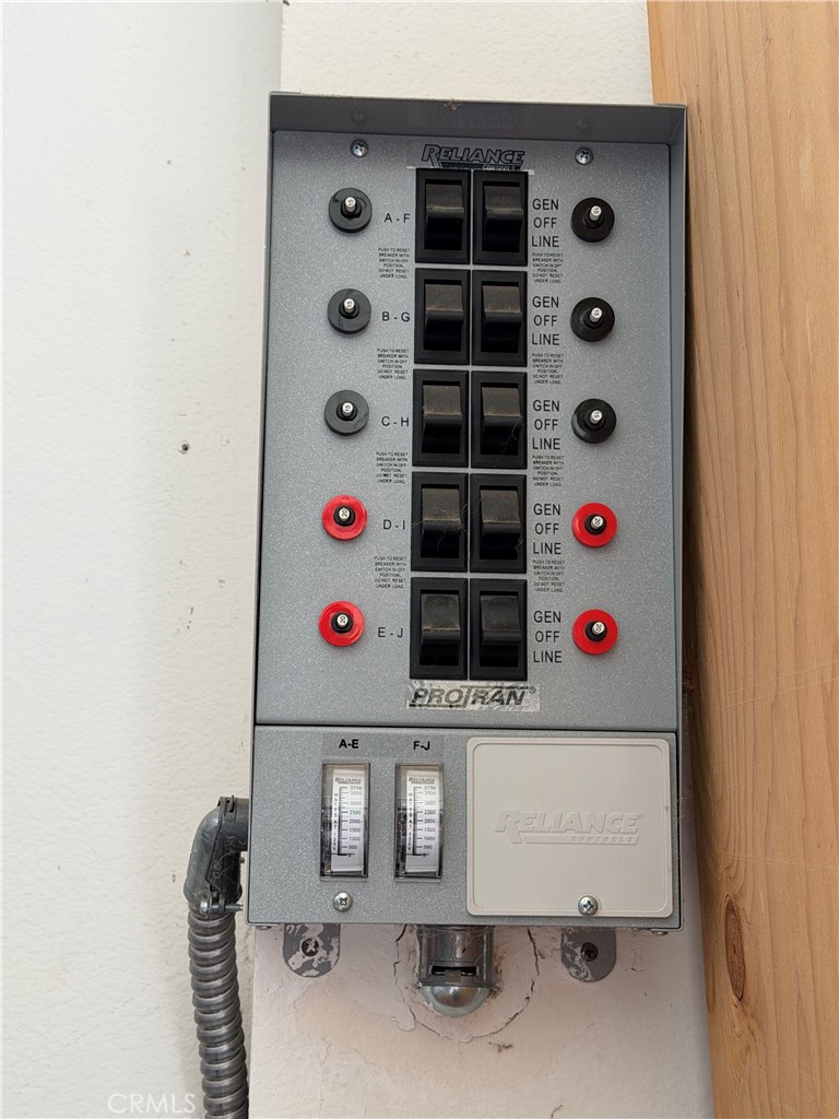 3839 Forbell Place Fallbrook, CA 92028 - Photo 44 of 98 Dedicated switch panel with 240 volt hook up for a generator.