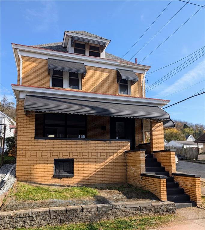 a view of a house with a balcony