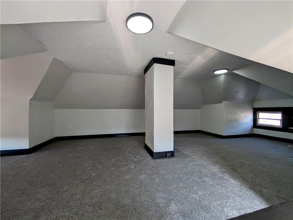643 Indiana Avenue Glassport, PA 15045 - Photo 15 of 32 a view of a livingroom with an empty space and a fireplace