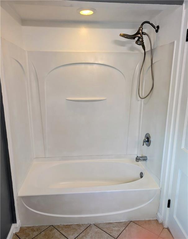 643 Indiana Avenue Glassport, PA 15045 - Photo 22 of 32 a bathroom with a bath tub with a shower